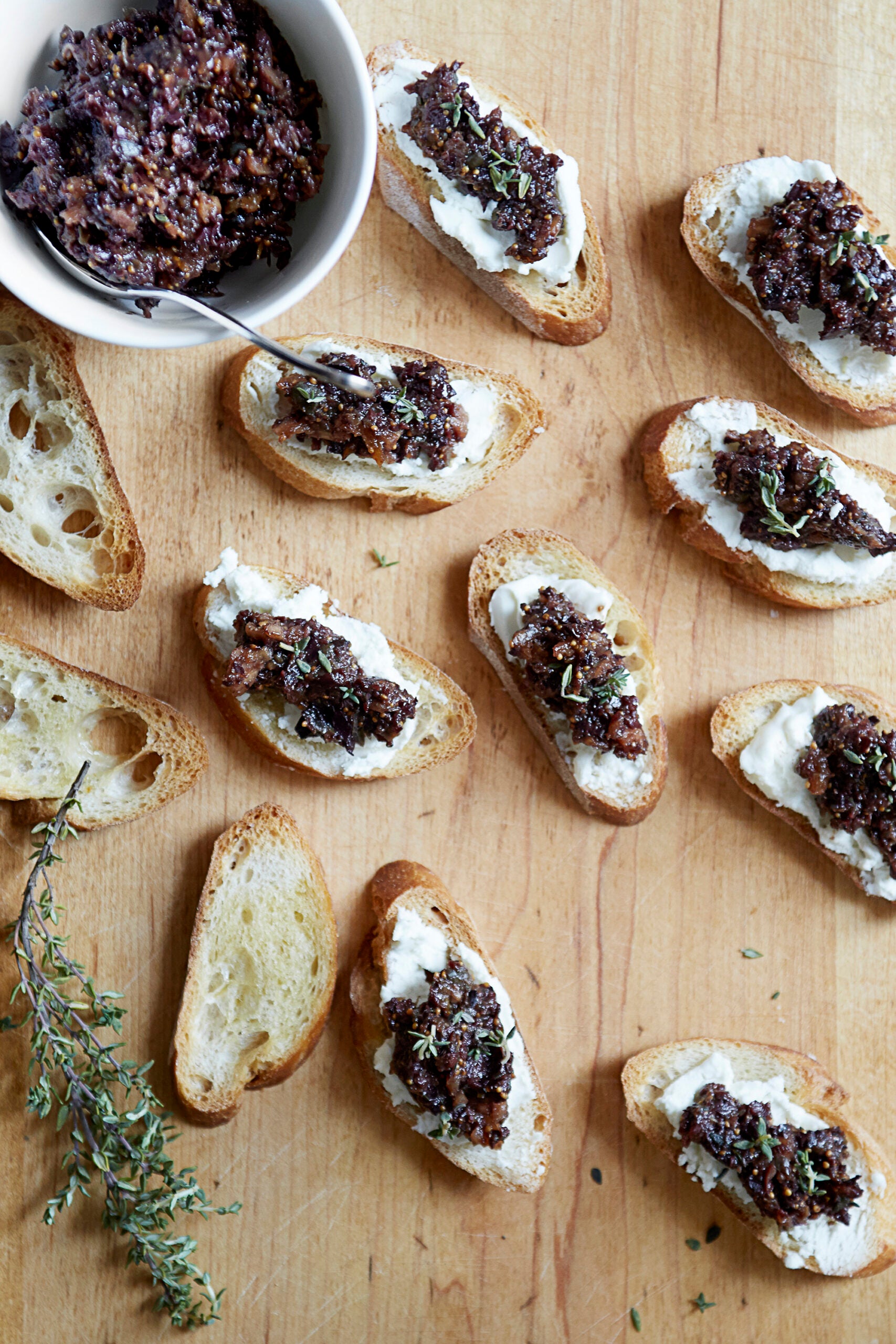 goat-cheese-crostini-with-fig-olive-tapenade-saveur