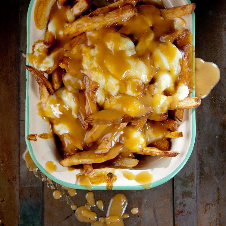 Poutine French Fries With Gravy And Cheese Curds