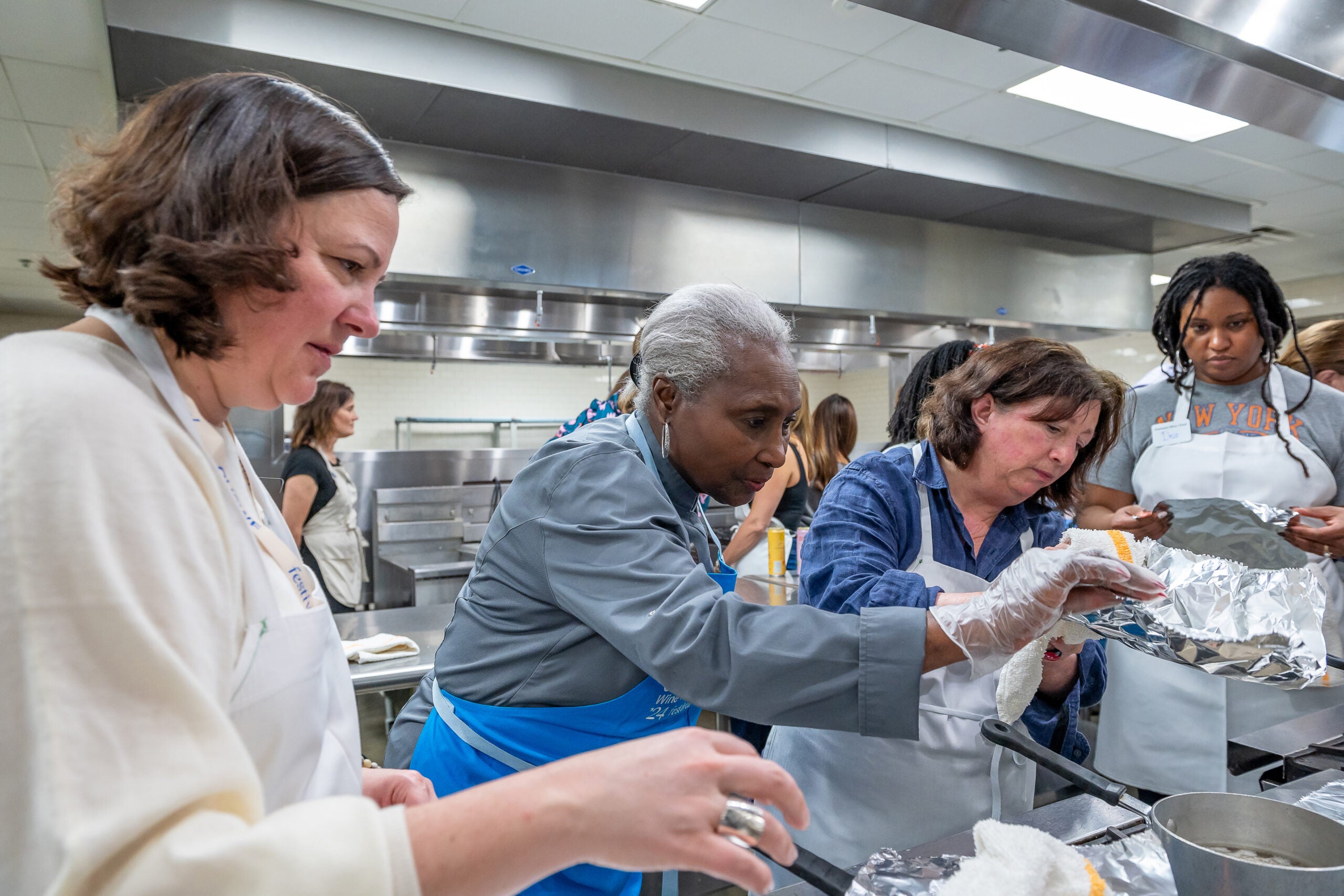 Chef Charlotte Jenkins inspects the work of her workshop’s .